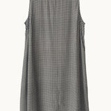Black and white gingham dress on a white background